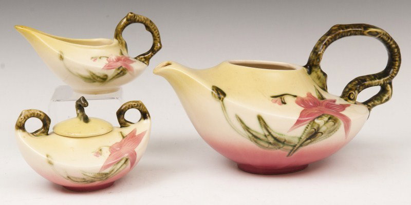 Hall's Pottery tea set: Hall's pottery tea set with orchid decoration including a teapot covered sugar and a creamer