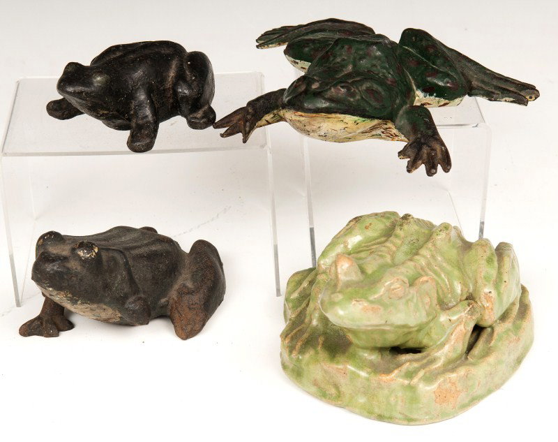 Early Cast Iron and Majolica Frogs: Grouping of early cast iron frog door stops and a Majolica door stop