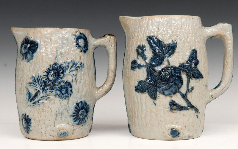 White's Utica Stoneware Pitchers: 2 Salt glaze stoneware pitchers with cobalt blue decoration attributed to White's Utica, NY, tallest is 7 1/2"h