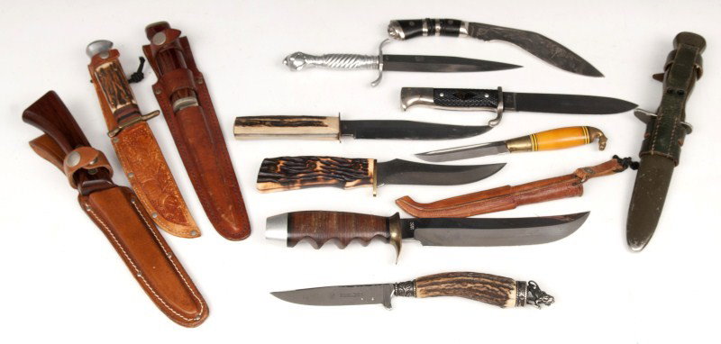 Grouping Knives, Rostfre, Western, Hitler Youth: Grouping of 11 knives including a military style Rostfrei knife, 2 Bowie Rostfrei knives, Western knife, a reproduction Hitler Youth Knife, 3 G.C. Co. Bowie knives, a Finnish knife along with another 