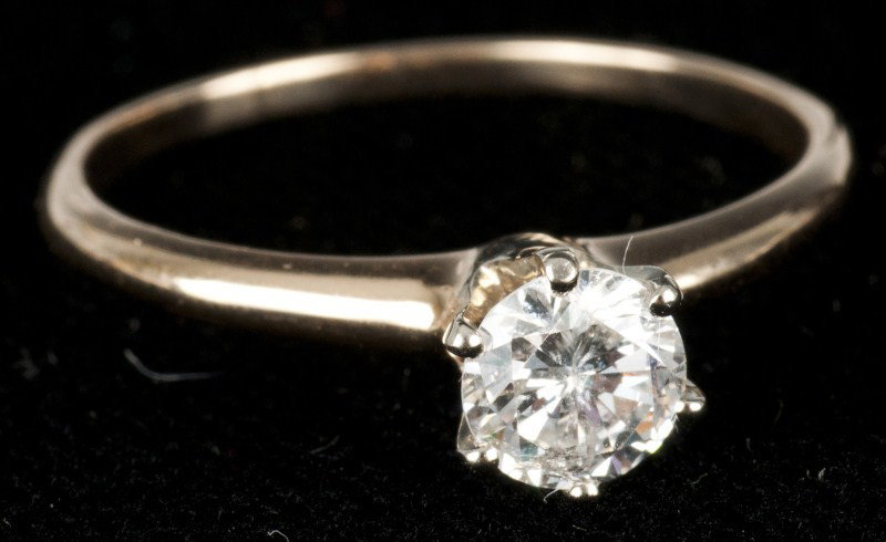 14K Diamond Engagement Ring: Diamond engagement ring, 14K yg solitaire setting containing a round brilliant cut diamond, approx. 0.50ct, SI2 clarity, G-H color, 1.1dwt