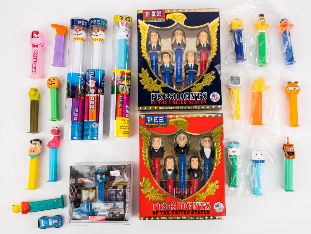 PEZ Dispensers Sets & Others: Variety of PEZ dispensers including President's of the US, Easter, Nascar, Sesame Street, Garfield and more, in as found condition.