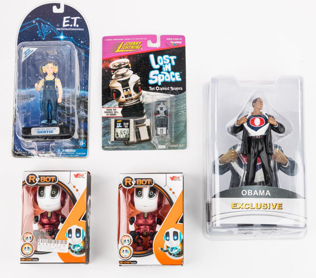 E.T., Obama, Lost in Space Collectible Figures: 2001 Toys R Us limited edition 'Gertie' figure NIB, 1998 Johnny Lightning Lost in Space 'Robot B-9' figure with film clip NIB, limited edition 'Super Obama' figure, and 2 die cast Ming Ying Robot reco