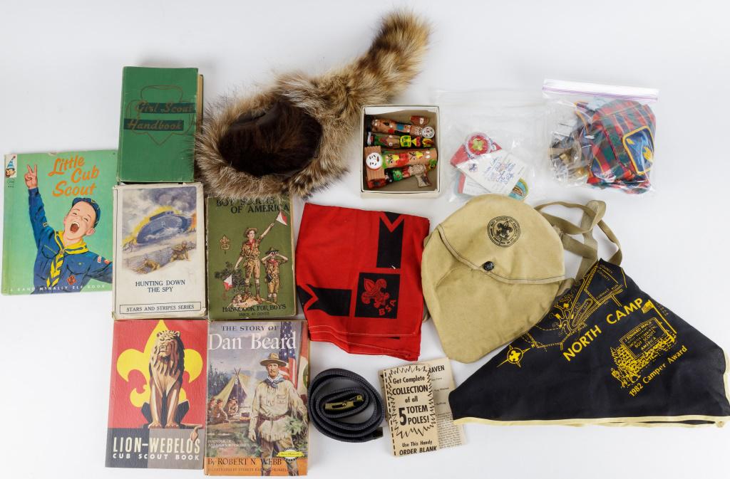 Boy Scout Memorabilia: Patches, pins, books, belt, bandanas, canteen bag and Davy Crockett fur hat and others.