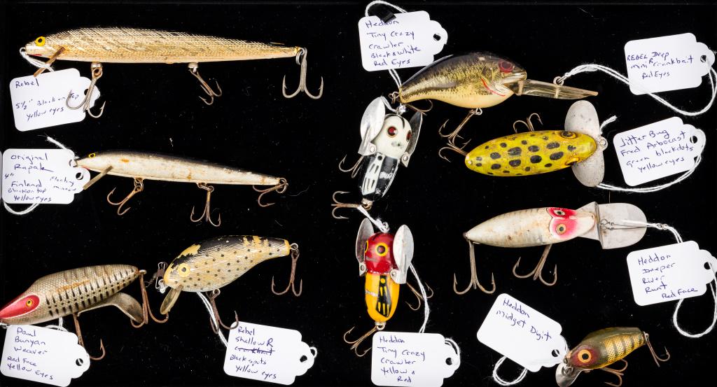 Vintage Wooden Fishing Lures: Paul Bunyan Weaver (red face, yellow eyes and black vertical stripes), Jitterbug Fred Arbocast (green dots, black eye), Heddon 'Go Deep River Runt' (red face), Heddon ' Tiny Crazy Crawler' (black and