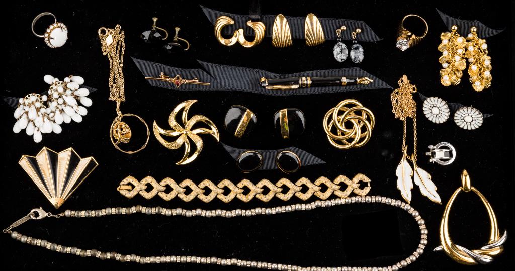 Trifari, Napier, S. Coventry Jewelry: 22 pieces of vintage and cotume jewelry featuring a vintage Trifari (1955-1969) 7" chain style bracelet, Napier earrings, pin, and silver tone 24" necklace, Monet earrings, pendant, and pin, two Sarah