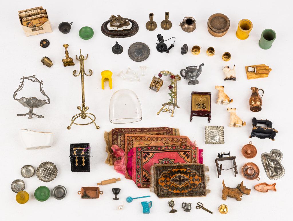 Dollhouse Miniatures: Variety of dollhouse miniatures including wood and metal kitchenware, porcelain dogs and cat, sewing machine, coat rack, hanging bird cage with bird, wood Scottish Terrier, telephone and more.