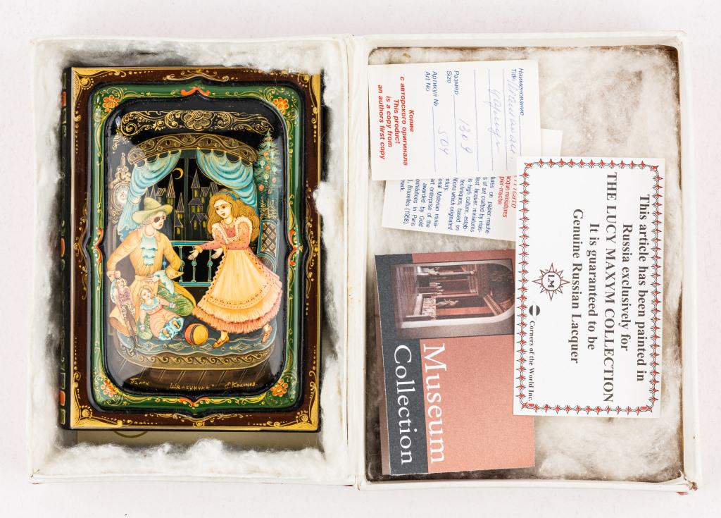 Palekh Russian Lacquer Box: Signed Palekh Russian lacquer hinged book style box of the 'Nutcracker Suite', with COA from Corners of the World and painted exclusively for the Lucy Maxym Collection, approx 3.5"W x 5"D.