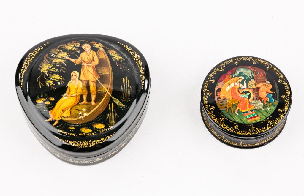 Signed Fedoskino Russian Lacquer Box & Another: 2 Signed Russian lacquer boxes, larger Fedoskino box with hinged lid approx 4" at widest x 4"D depicting young man and woman in boat, and smaller round box with sticker marked 'The Mole Hole, N. Chern