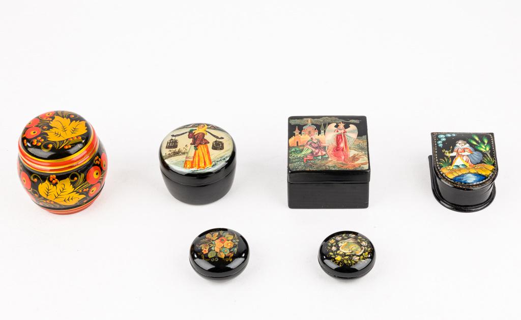 Unsigned Russian Lacquer Boxes: 6 Unsigned Russian lacquer boxes, in various styles depicting various scenes including fairy tales, floral, and rabbit, round boxes marked 'Made in Russia' and 'Made in USSR', red and gold jar has pap