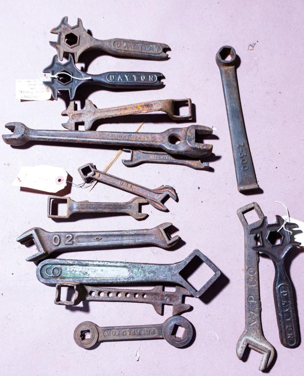 Early 20th C Wrenches (14): Includes wrenches by W.P. Co., 12 .75" long Bell System, Planet Jr., Cleveland Faucet Co., three different Dayton Plow Co., and 4 others. Also, includes a ratcheting The Bay State wrench (smaller side