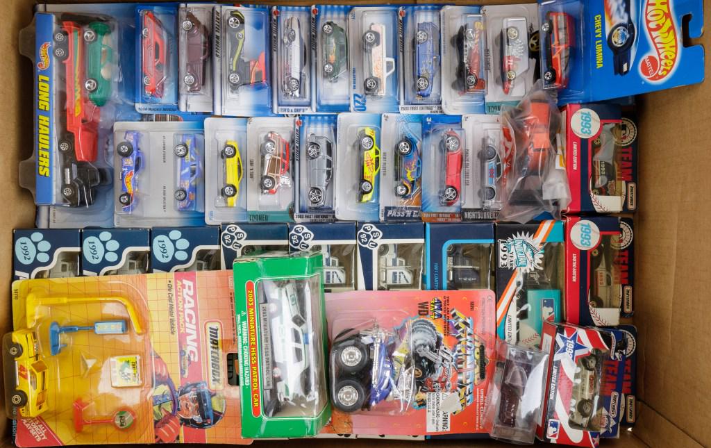 Team Hot Wheels, Diecast in Original Package: 19 Hot Wheels toy cars on hang cards, 12 Sports Team Diecast cars (most Penn State Trucks), and 5 others.