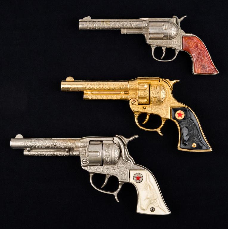 Toy Revolvers / Cap Guns (3): Hubley, Texan Junior, and Texan longest at 9.5".