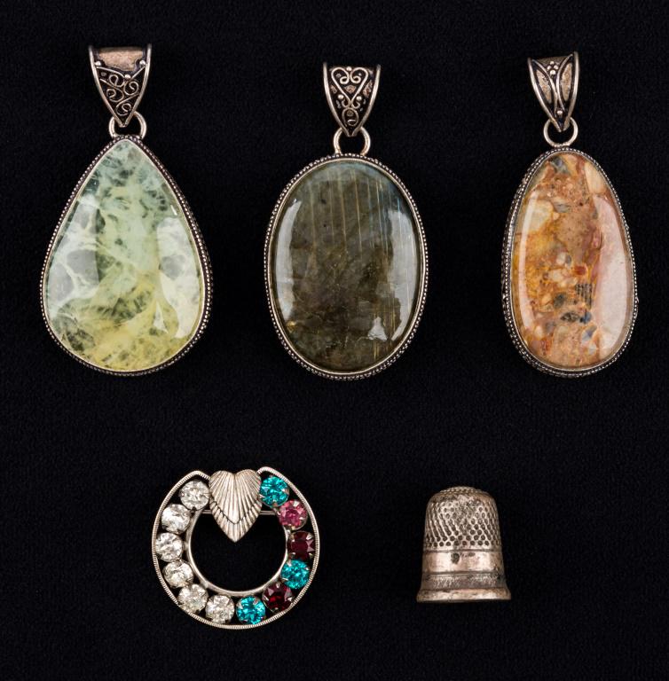 Sterling Pendants and More: Three large colorful stone pendant set in sterling silver, all approx 1.5" H. Also a sterling brooch with green and clear rhinestone and a thimble.