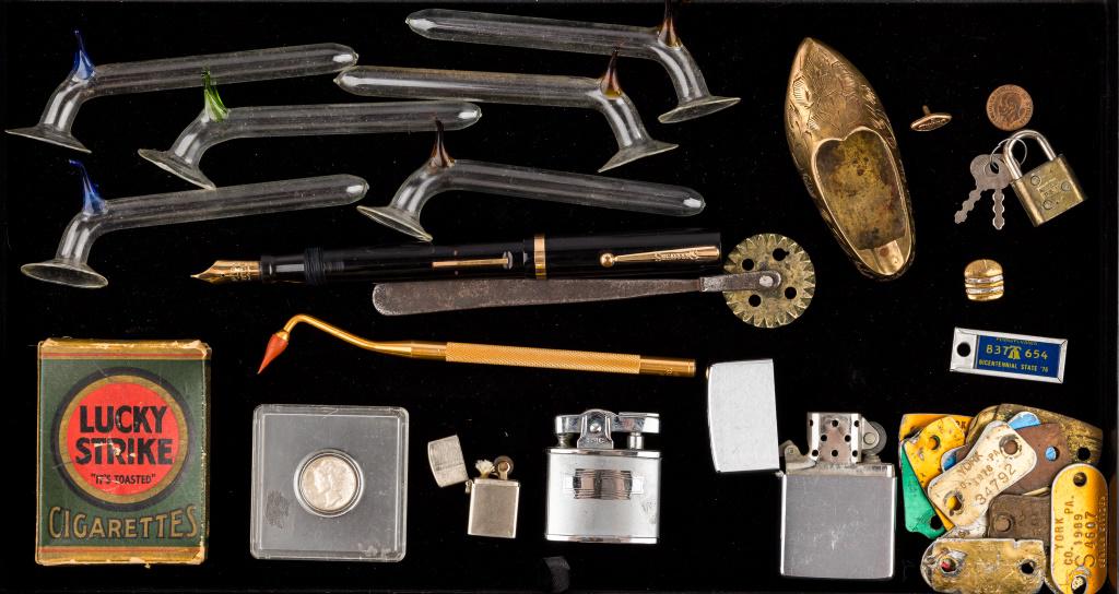 Vintage Dog Licenses, Lighters & More: Approx 15 vintage York PA dog licenses, 1937 Mercury dime, Lucky Strike wind up trick pack of cigarettes (worked when wound), vintage Zippo and Supreme brand lighters with miniature Japan lighter, 6 t