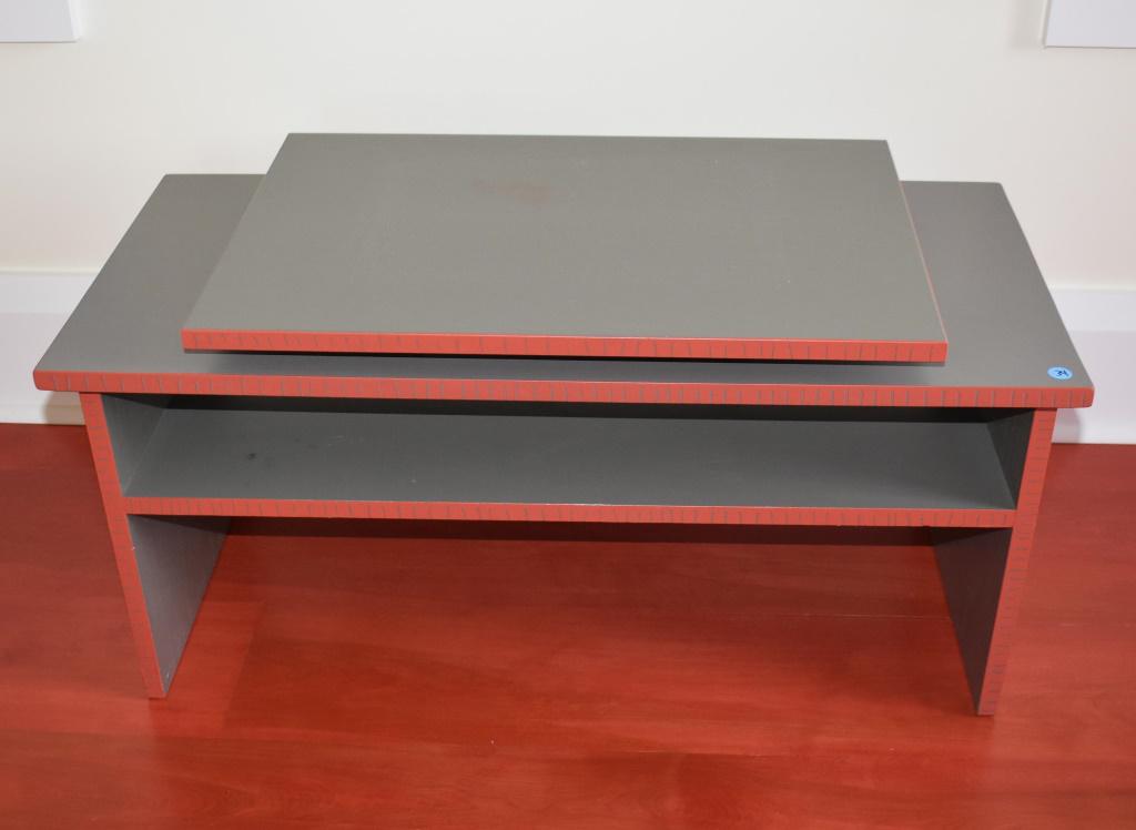 Modernist Gray Painted Entertainment Center: This is modernist gray painted entertainment center with orange accented edges and sides. Measures approx 15 1/2" H x 34 1/4" W x 16" D.