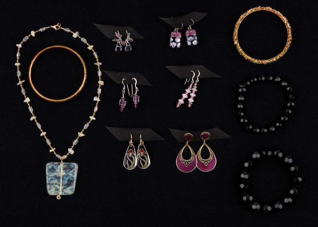 Sterling, Dusi, Burch & Matisse Renoir Jewelry: 11 pieces of jewelry featuring 3 pairs of sterling and glass earrings(one is fused glass, one is lampwork beads, and one is glasswork), a pair of Claudio Duti Art Deco earrings, Laurel Burch "Wid iris