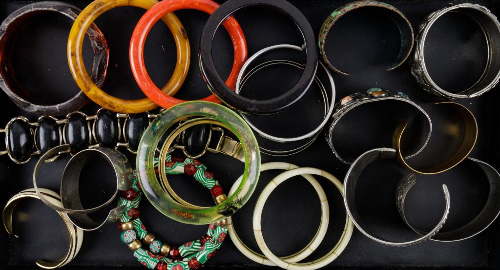 Sterling, Monet, Lucite & Other Bracelets: 1 Plain and 1 floral designed Danecraft sterling silver cuff bracelets approx 22.9 DWT, Monet gold tone bracelet, Mexico marked bracelet with abalone (some shell missing), green lucite style bracelet