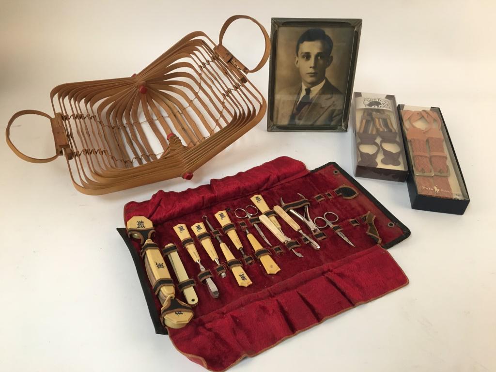 Antique Manicure Set, Basket, Designer Suspenders: Antique celluloid handle (French ...) manicure set (mostly intact) with 2 bone handle replacement pieces, a May 1908 patent picture frame approx 6.5" x 8.5" with photo of man, a Made in Japan collapsi