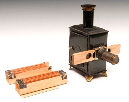 Magic Lantern: Magic lantern, tin and original lamp inside along with 11 slides