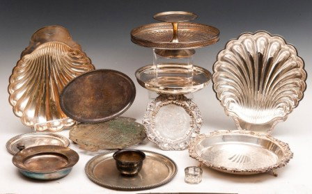 Large Grouping of Silver Plated Items: Large grouping of silver plated items including a child's warming plate, compote, trays, trivits, pair of shell plates, etc.