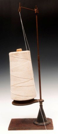 Large Country Store String Holder: Large early 20th C country store string holder marked Simanco mounted on a wood plank, 25"h