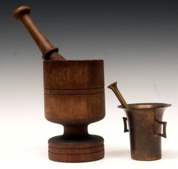 Two Early Mortar and Pestles: Early mortar and pestle lot including a treen wood mortar and pestle and a brass mortar and pestle, 19th/Early 20th C, largest is 12"h