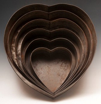 19th C Nested Set of six Graduated Heart Cake Tins: 19th C nested set of six graduated heart cake tins; excellent condition; rare find; largest measuring 19"h x 18"w x 3"d, smallest 9"h