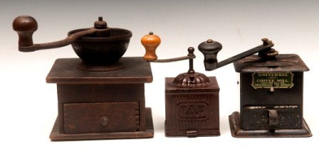 Coffee Mills: Universal Coffee Mill metal patd 1905, F & B metal coffee mill and a wood and metal coffee mill with décor iron handle