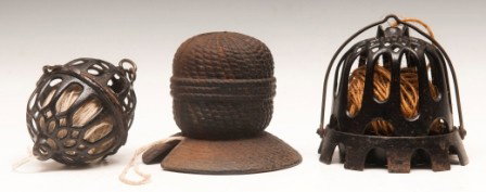 Three Metal String Holders: Three holders, one iron with string pattern molded into base and shape in the form of a string ball; one round ball string holder 4-1/2" and one string dispenser w/base and 5-1/2" round top