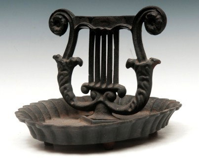 Boot Scrapper: Cast iron boot scrapper, 7-1/2"h x 11-1/2"l, decorative harp, black paint