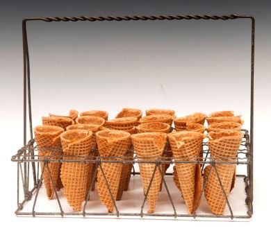 Ice Cream Cone Holder: 1880's ice cream parlor cone holder in twisted wire frame with twenty-four cone slots 13" x 9"