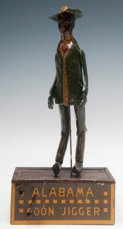 Black Americana Wind Up Toy: "Tombo, Alabama Coon Jigger" tin litho wind up toy, pat. 1910, Strauss Mfg. Co., 10" with good paint (work)
