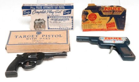 Tin Play Pistols: Two pistols, "Police Automatic Cap Pistol" with various paperwork and tin police badge; one Marx target pistol with box, (missing dart)