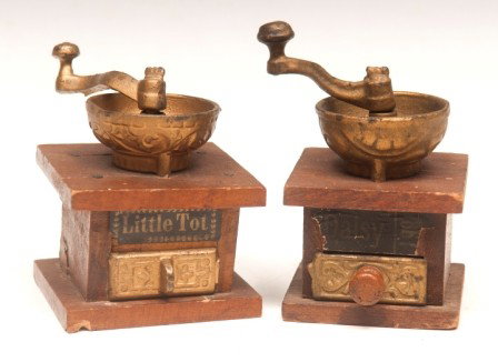 Toy Coffee Grinders: "Little Tot" toy coffee grinder with paper label 3" and one "Daisy" toy coffee grinder with paper label, metal grinding tops with handles