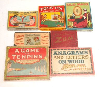 Games and Puzzles: Group of seven games and puzzles, Pirate and Traveler, Toss 'Em Horse Shoe Game, Old Maid, A Game of Tenpins, A Good Game of Zum, Spelling and Anagrams and Anagrams and Letters on wood, all original b