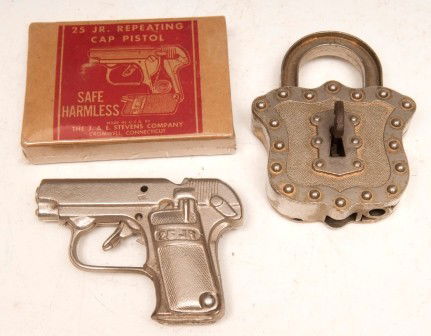 Hubley Lock Cap Pistol: One Hubley Padlock cap pistol in working order with key and one 25 Jr. Repeating Cap Pistol with box