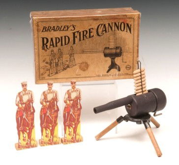 Toy Rapid Fire Cannon: Bradley's rapid Fire Cannon with original box complete with contents, wood bullets, 3 stand up target soldiers