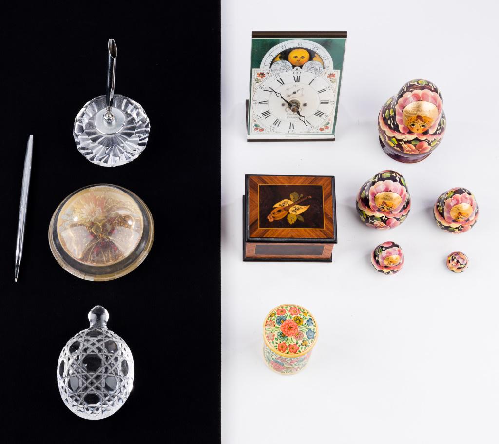 Waterford and Other Desk Items: Waterford crystal turtle paperweight, Waterford crystal pen holder and pen, Reuge music box playing Dance of the Flowers, nesting dolls, desk clock Made in England, round plastic weighted paperweight 