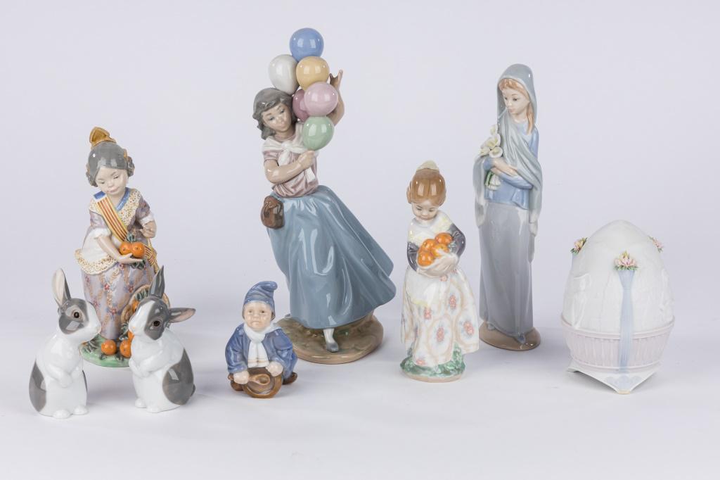 Lladro and Other Porcelain Figurines: Five Lladro, two Porcelain rabbits, Royal Copenhagen boy with spoon and drum.