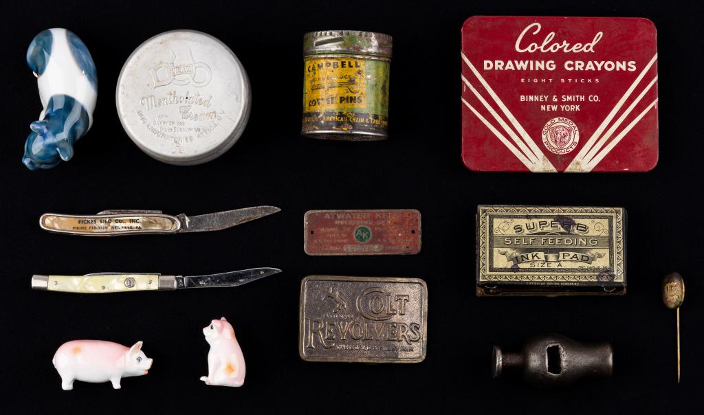 Vintage Cap Cannon, Tins, Pigs & More: There is a vintage cast iron cap gun cannon (approx 2 1/2" L), tins (Superb ink pad, Binney & Smith New York Crayons, Velva Mentholated Cream, Campbell cotter pins), two advertising pocket knives, and