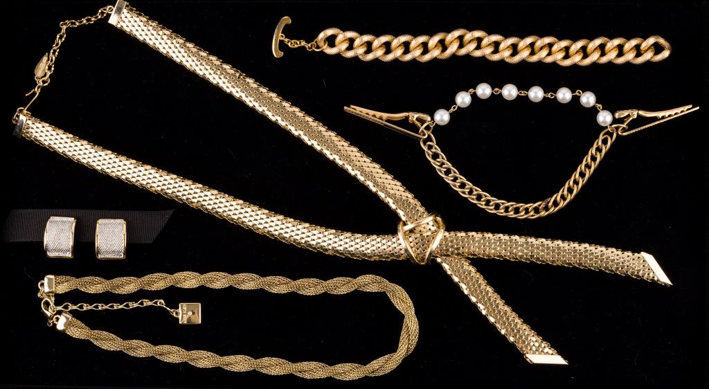 Whiting & Davis, Anne Klein, and More: A vintage Whiting and Davis Co. gold tone scale mesh cross over necklace/bolo, a 20" Anne Klein twisted mesh rope necklace, a vintage double strand sweater clip with faux pearls, a large link chain br