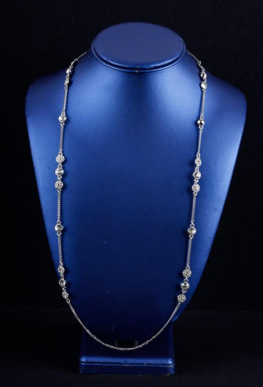 Givenchy Necklace: Givenchy silver tone drop necklace with crystal accents, measures 21" drop, can be worn double stranded.