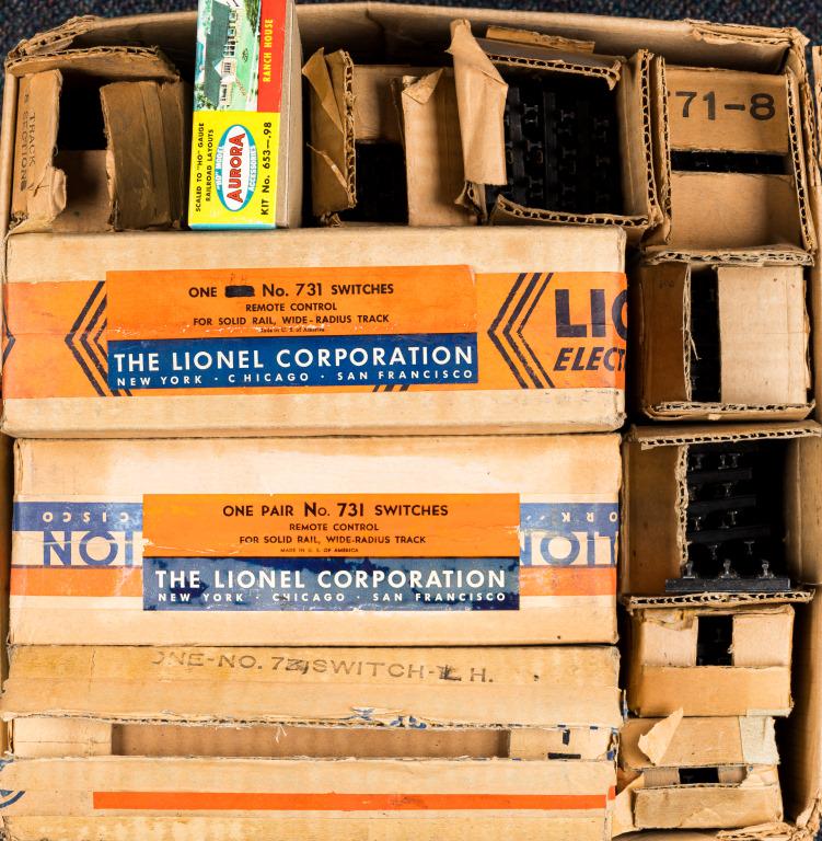Lionel Train O Gauge Track & Switches: Includes 3 pairs of #731 switches, 7 boxes of O gauge track. All in boxes, untested.