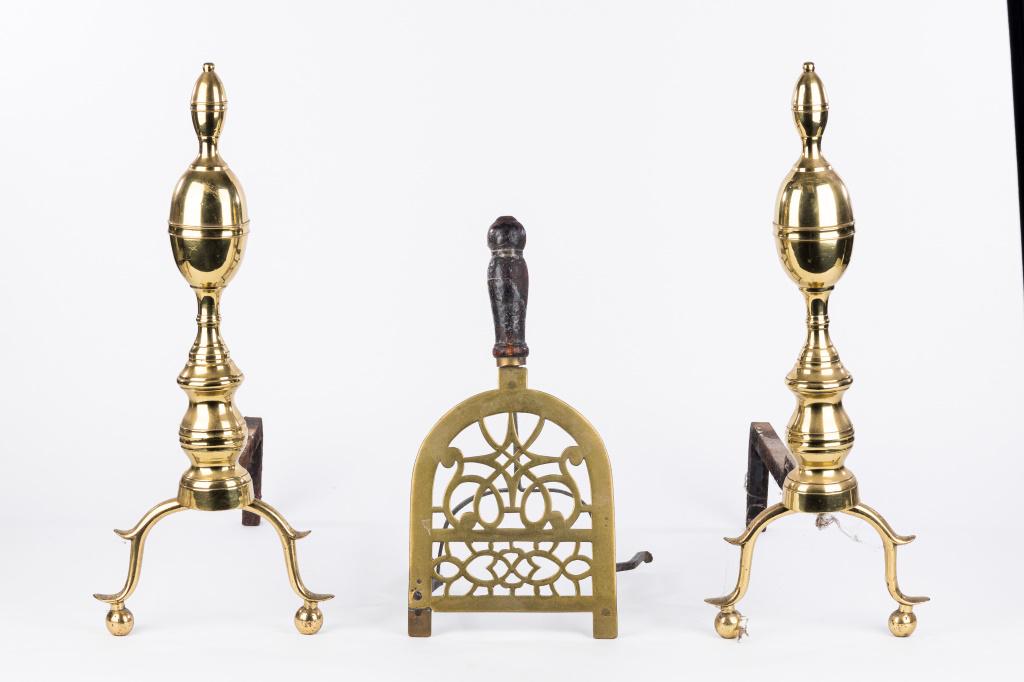18th C Philadelphia Andirons & Footman: Three pieces including 18th C Philadelphia Double Lemon andirons measuring approx 20 1/2" H x 8" W x 17" D & the footman / trivet / pot Warmer measures approx 9" H x 15" W x 7" D. The footman has an e