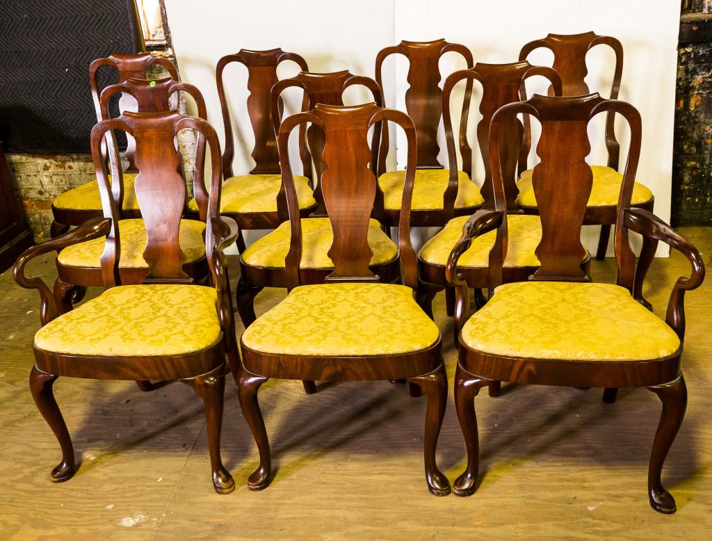 Fine Dining Table and 10 Chairs: Upholstered yellow seats. Pedestal table with 2 leaves.Table 53" x 53" without leaves. Each leaf approx 53" x 22". Height of chair back is approx 39" H.