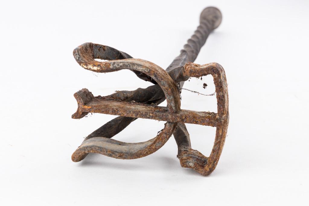 Branding Iron: Hand wrought branding iron measures approx 22 1/2" L. There is oxidation on the iron.