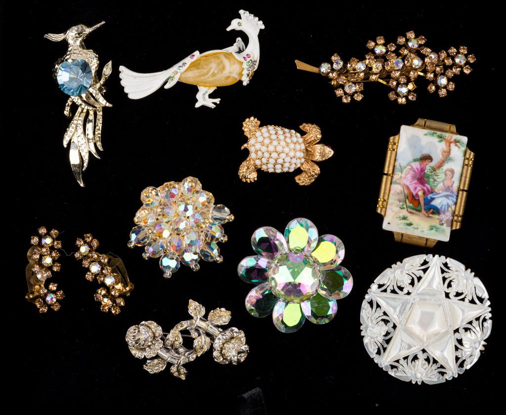 Vintage Brooch Collection: 10 pieces including painted porcelain Limoges, Coro Ducette, carved mother of pearl 5 pt star marked Bethlehem, AV turtle, peacock, roadrunner, rhinestone branch brooch with matching earrings, and mor