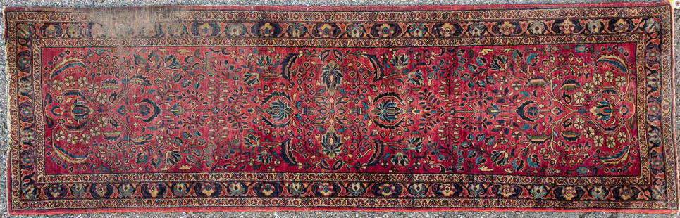 Semi Antique Persian Runner: Approx 25" x 78" with red field and border, central pattern like trees with blue red and tan leaves. Needs cleaning and there is fringe loss. These rugs are from estates and have wear associated with