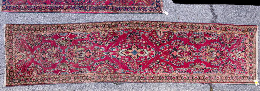 Semi Antique Persian Runner: Approx 10' L x 30" W with red field and brown and pink floral border with green leaves. (Old label on back CU 0654 22849) Wear and fringe loss. These rugs are from estates and have wear associated wit